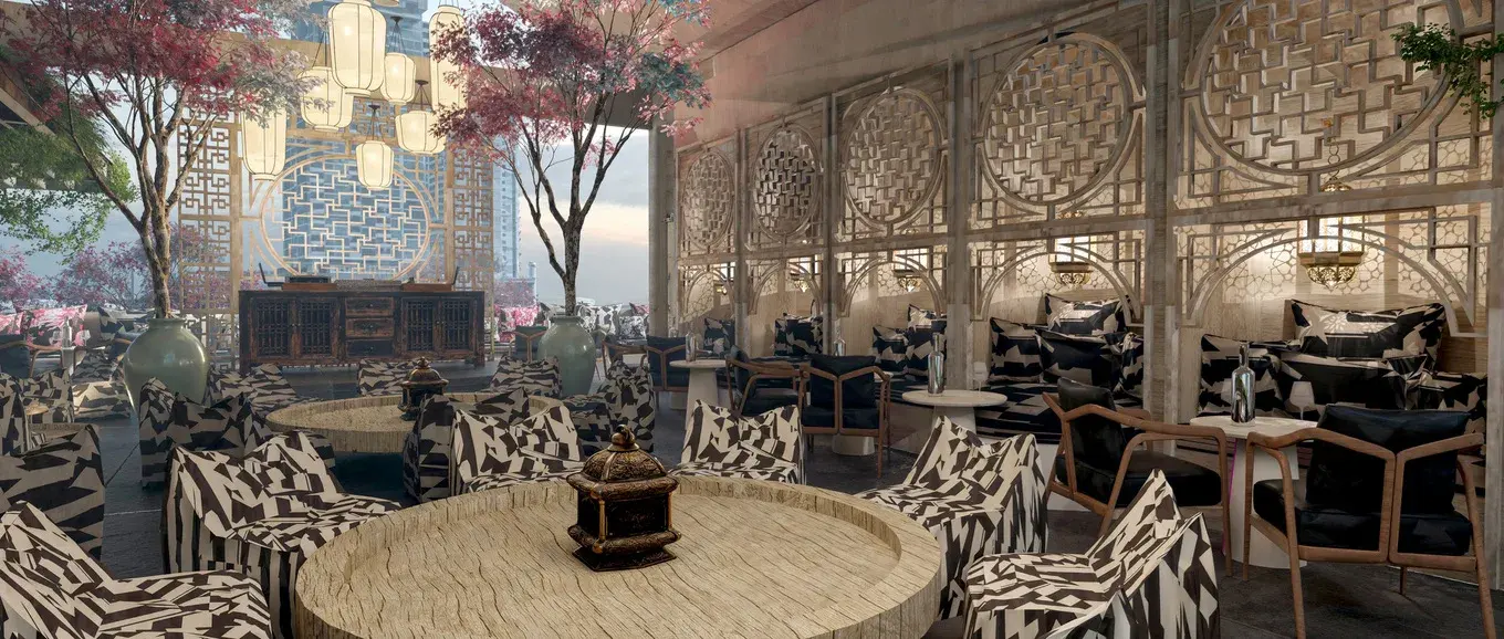 Render of a lounge behind carved timber screens with a round central table, patterned armchairs and a red maple